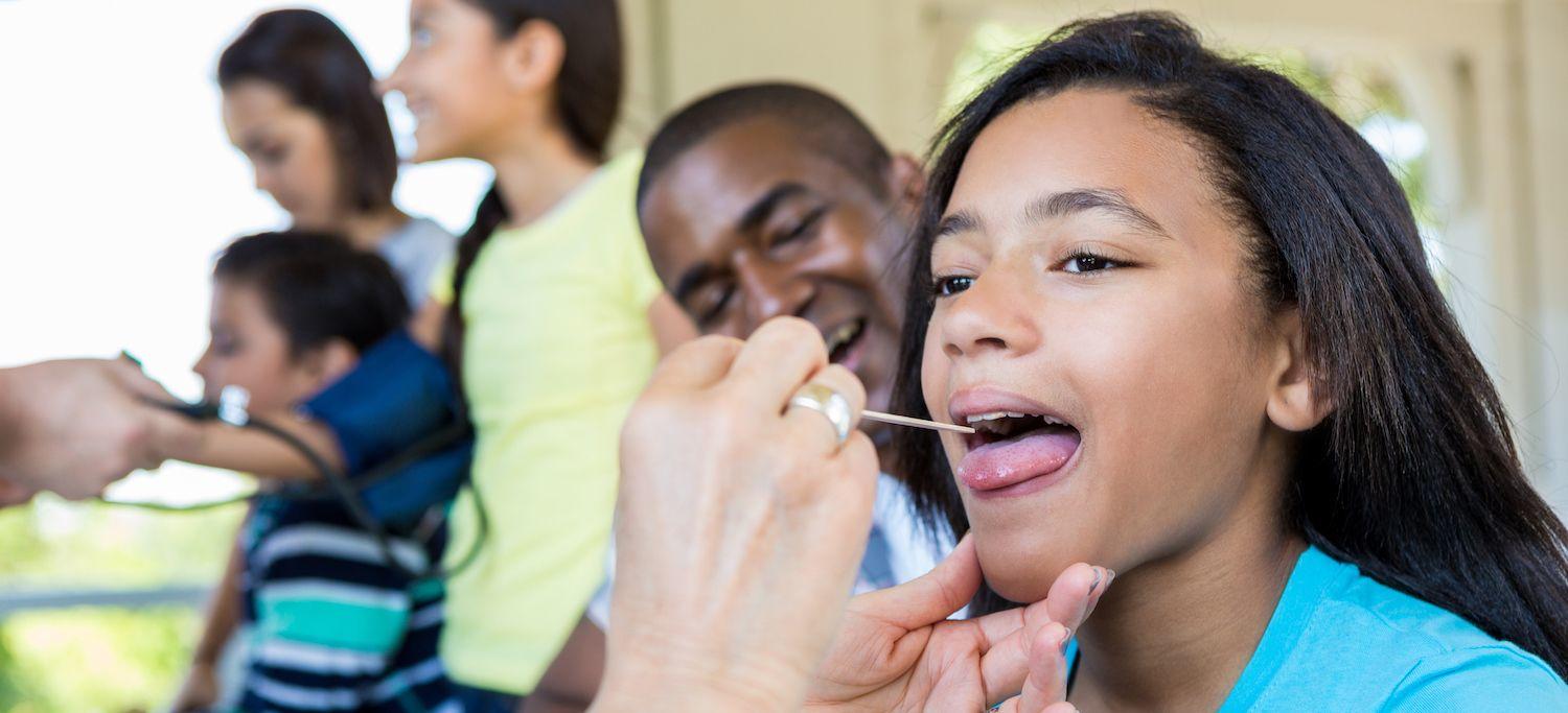 Young Black Girl Receives Oral Health Care at a Community Oral Health Clinic